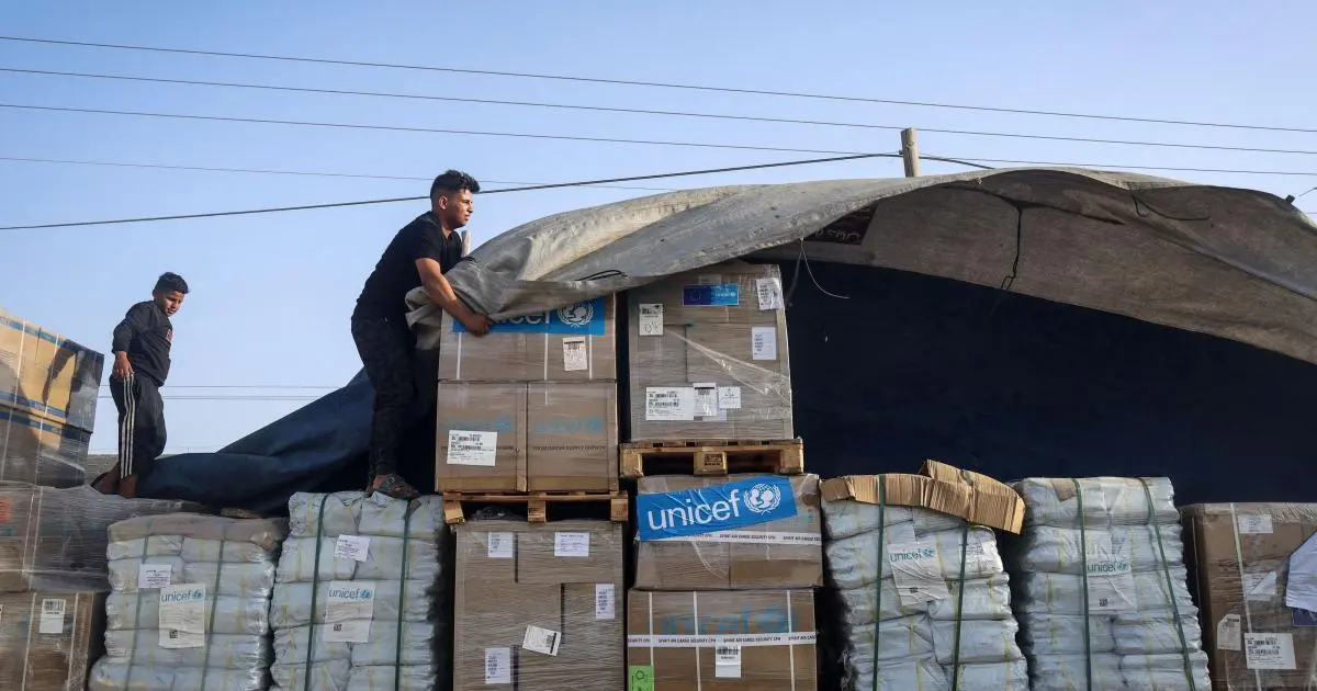 UN aid convoy halted at Gaza-Israel border checkpoint due to ongoing restrictions.